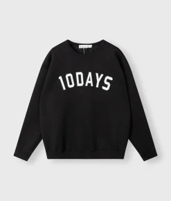 THE STATEMENT SWEATER
